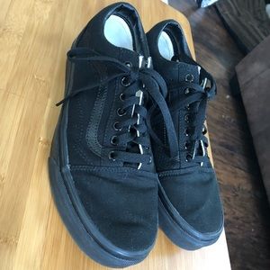 All black vans skate lows